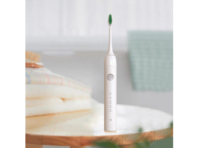 How to use a sonic electric toothbrush for the first time